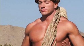 Perfect-shaped hunks are having a nice oral sex in the desert