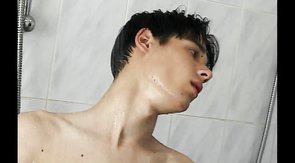 Skinny young boys are taking shower and jerking their dicks