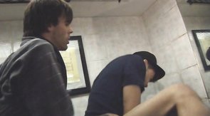 Curly-haired Mexican twink sucking dick in the toilet