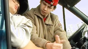 Hot youngster is blowing his mate's dick in the car