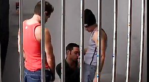 Prisoner is getting fucked in his mouth by two cocks