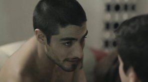 Two alluring boyfriends are kissing each other