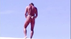 Beach Striptease: Tanned Hunk Bares All
