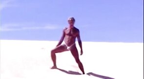Beach Striptease: Tanned Hunk Bares All