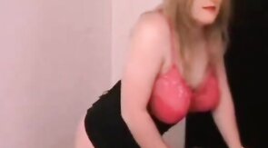 Crossdresser in Corset and Stockings