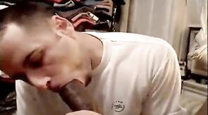Muscular Amateur Sucks a Huge Black Cock