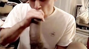 Muscular Amateur Sucks a Huge Black Cock