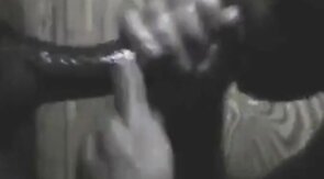 Black Hunk Sucks Big Cock Through Glory Hole