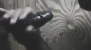 Black Hunk Sucks Big Cock Through Glory Hole