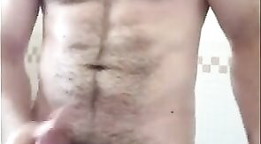 Hairy Bear Strokes His Cock in the Tub