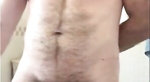 Hairy Bear Strokes His Cock in the Tub