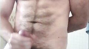 Hairy Bear Strokes His Cock in the Tub