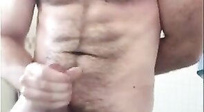 Hairy Bear Strokes His Cock in the Tub