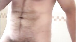 Hairy Bear Strokes His Cock in the Tub