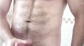 Hairy Bear Strokes His Cock in the Tub