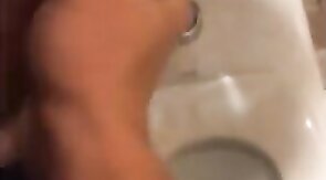 Hardcore Action in the Bathroom with Gaping and Handjobs