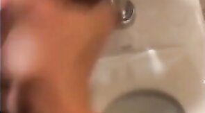 Hardcore Action in the Bathroom with Gaping and Handjobs