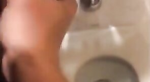Hardcore Action in the Bathroom with Gaping and Handjobs