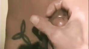 Playing with his big cock and cumming hard all over