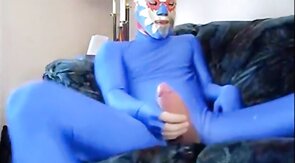 Masked Guy in Blue Zentai Suit Strokes Big Cock