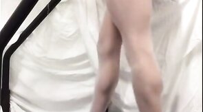 Crossdresser in White Stockings on Treadmill