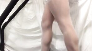 Crossdresser in White Stockings on Treadmill