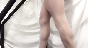 Crossdresser in White Stockings on Treadmill