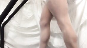 Crossdresser in White Stockings on Treadmill