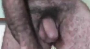 Hairy Daddy Strokes His Cock