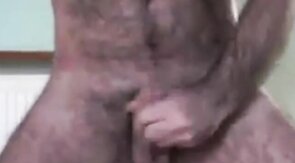 Hairy Daddy Strokes His Cock