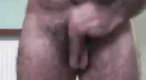 Hairy Daddy Strokes His Cock