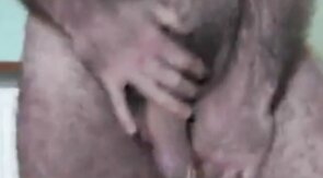Hairy Daddy Strokes His Cock