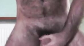 Hairy Daddy Strokes His Cock