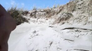 Exhibitionist Strokes Hard on the Beach