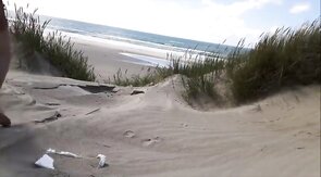 Exhibitionist Strokes Hard on the Beach