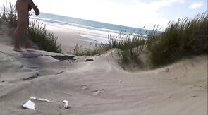 Exhibitionist Strokes Hard on the Beach