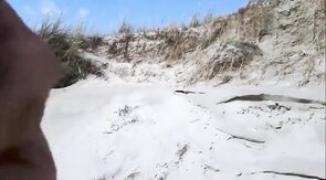 Exhibitionist Strokes Hard on the Beach