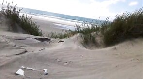 Exhibitionist Strokes Hard on the Beach