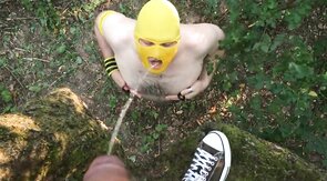 Pissing Master Uses Slave Outdoors for Pleasure