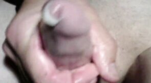Twink's Webcam Handjob: Small Cock, Big Condom Fun