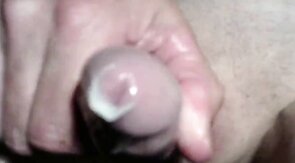 Twink's Webcam Handjob: Small Cock, Big Condom Fun