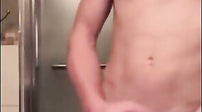 Muscular Twink Strokes His Big Cock in Bathroom Solo