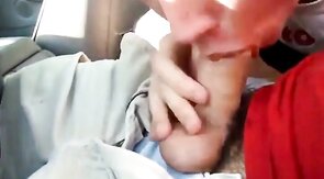 Sucking my buddy's cock in the car, he cums in my mouth - amateur video