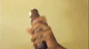 Black guy jacks off his big cock and cums hard