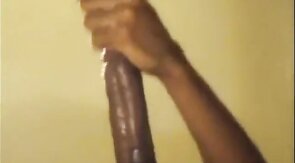 Black guy jacks off his big cock and cums hard