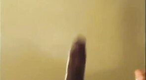 Black guy jacks off his big cock and cums hard