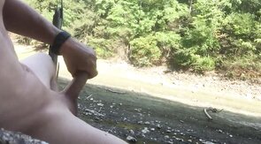 Naked Muscle Hunk Jerks Off at the Beach