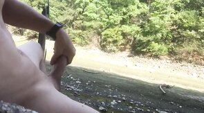 Naked Muscle Hunk Jerks Off at the Beach