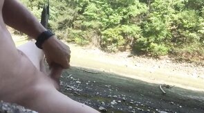 Naked Muscle Hunk Jerks Off at the Beach