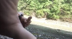 Naked Muscle Hunk Jerks Off at the Beach